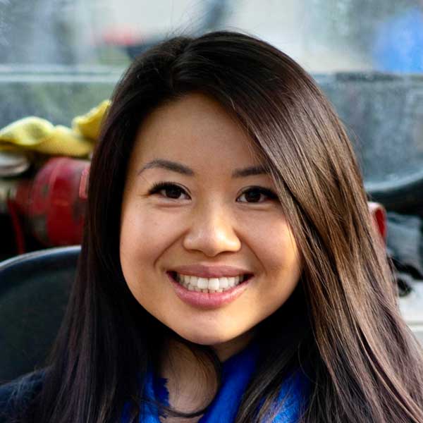 smiling female with long brown hair - Stefne Wang