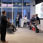 several panelists talking in a room