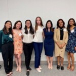 group of young women standing together