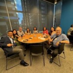 people sitting at a round table