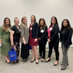 femails standing in a group