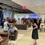 female presenting to a group