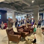 male presenting in front of group