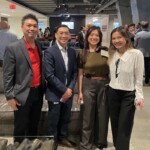 2 males and 2 females standing