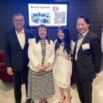 2 males and 2 females standing