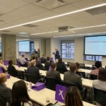 people watching a presentation