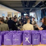 purple bags with xfinity logo